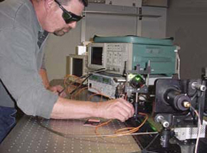 An engineer works with a machine that measures air data