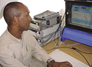An engineer works on a computer that provides air data for air vehicles