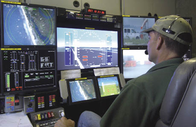 Man watching an electronics and video panel Man watching an electronics and video panel