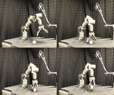 A series of four images of a robot claw picking up a golf ball 