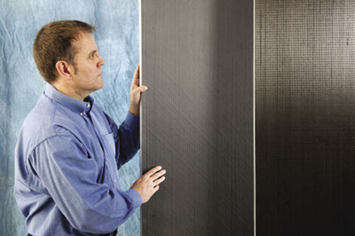 Man with two TYCOR panels Man with two TYCOR panels