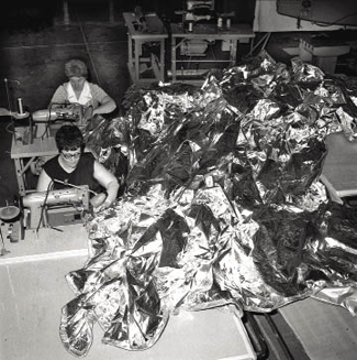 Seamstresses work on sunshade for Skylab Seamstresses work on sunshade for Skylab