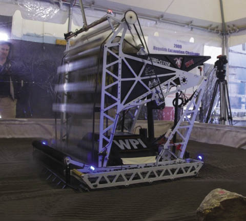 Moonraker excavation robot collecting regolith Moonraker excavation robot collecting regolith
