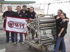 College student team posing with their regolith excavator robot College student team posing with their regolith excavator robot