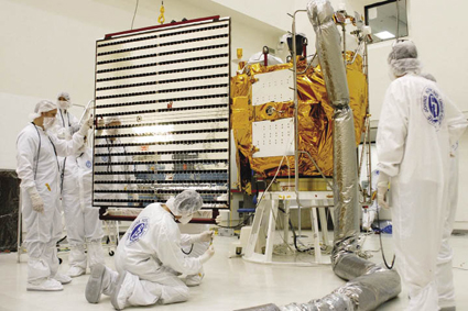 Technicians working on the MESSENGER spacecraft Technicians working on the MESSENGER spacecraft