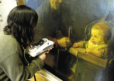 Tracer scanner being used on a painting