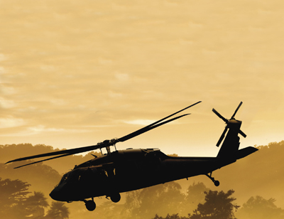 Helicopter hovers over a forest Helicopter hovers over a forest