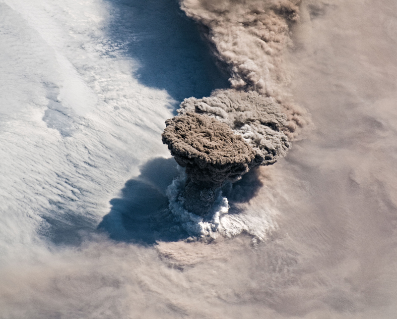 volcano spewing ash cloud