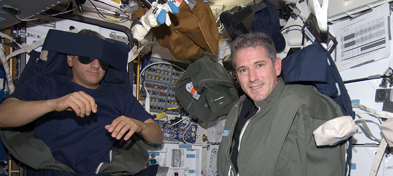 Astronauts in sleeping bags