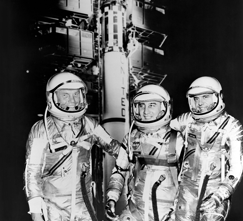 Astronauts John Glenn, Gus Grissom, and Alan Shepard in their spacesuits