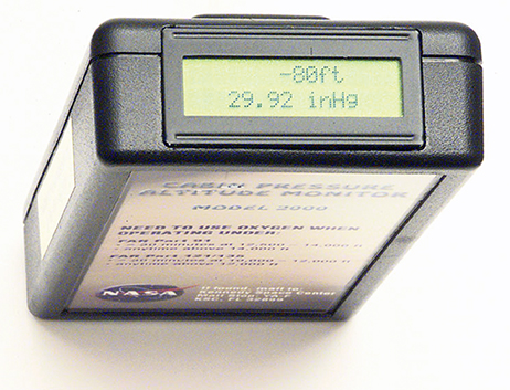 The digital display provides a text message of the warning