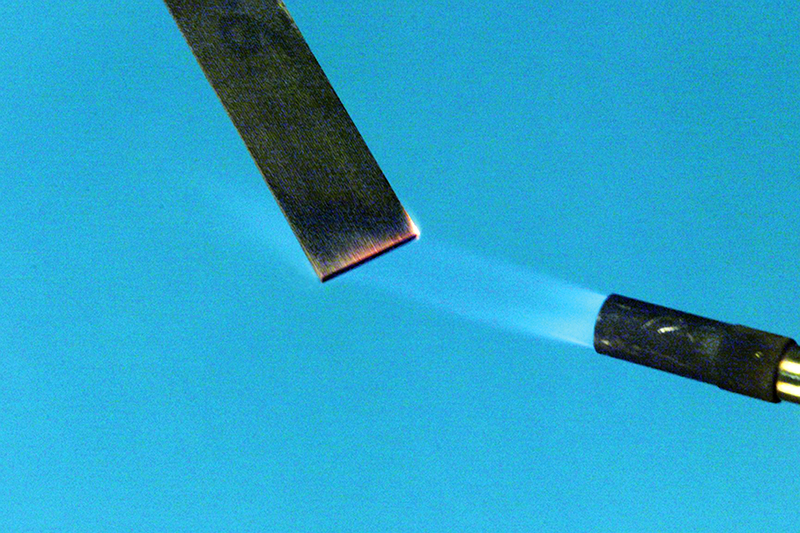A piece of polyimide RP-46 resists a blowtorch flame
