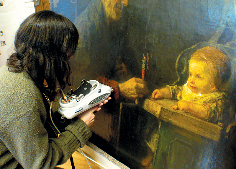 Tracer scanner being used on a painting