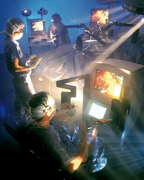 Doctors seated in the ZEUS Robotic Surgical System