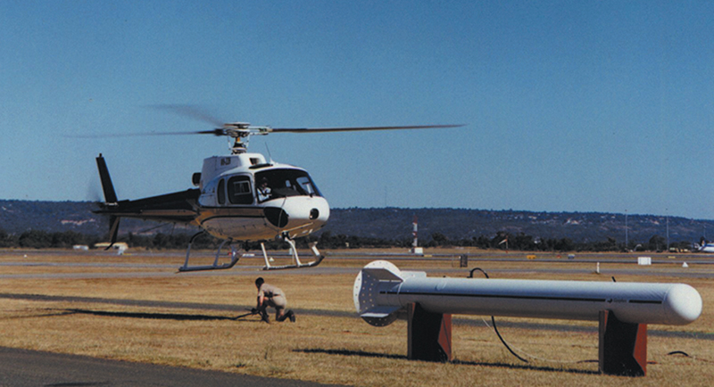 The GEM-2A airborne sensor shown with a helicopter