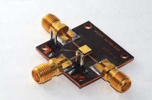 A microelectromechanical single pole double throw relay