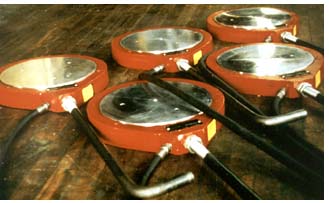 photo of five Dudgeon 700-ton load cells/hydraulic jacks