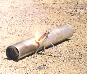 Thiokol Propulsion's de-mining flare burning through the outer casing to neutralize the explosive agents inside