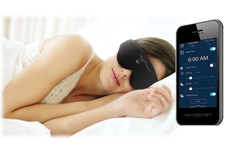 A woman lies in bed wearing the Illumy sleep mask. A smartphone shows the Illumy app interface.