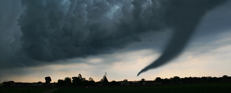 a tornado in a stormy sky