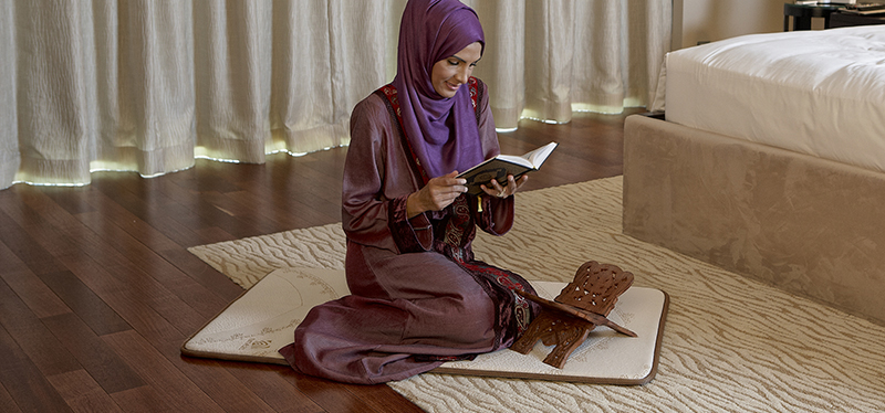 woman on a prayer mat