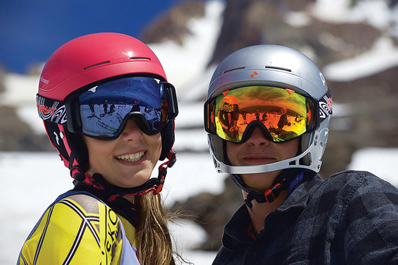 Skiers wearing protective lenses