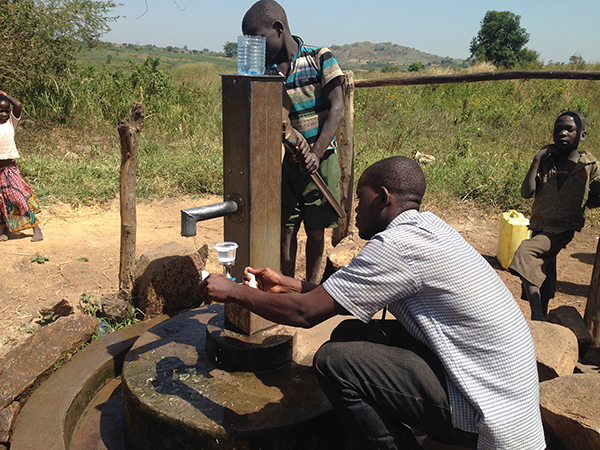 People collecting water samples for testing