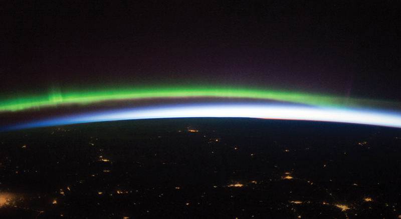 Earth atmosphere with green “airglow” band