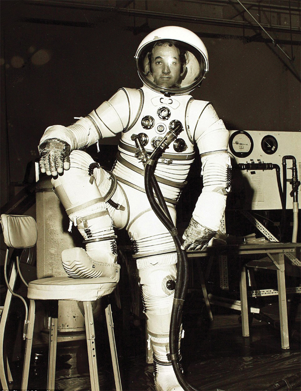 NASA engineer in a space suit prototype