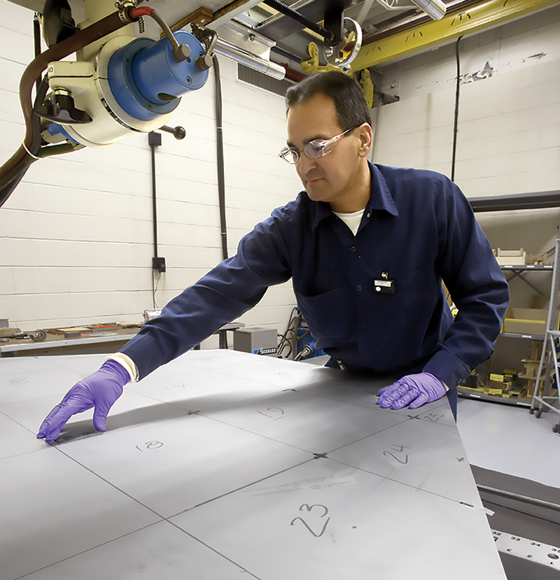 Radiographer prepares a beryllium mirror blank