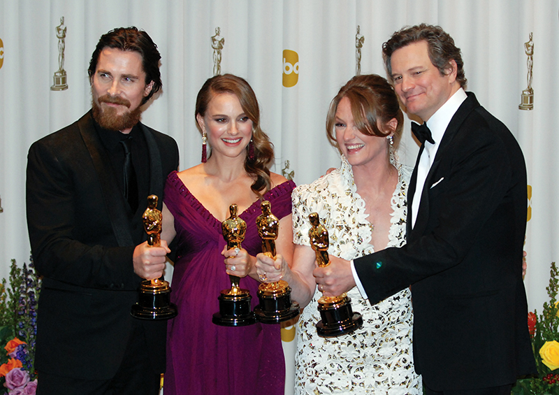 Christian Bale, Natalie Portman, Melissa Leo, and Colin Firth holding Oscars