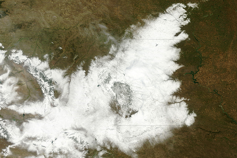 Satellite image of snowfall across Wyoming and South Dakota