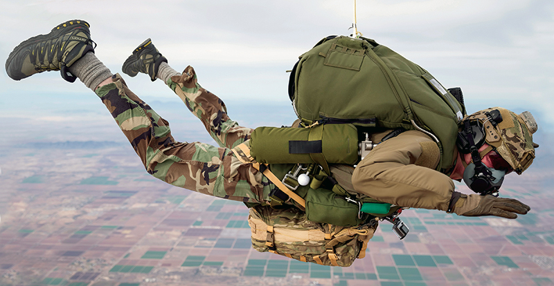 A falling parachutist wears a Cobham gas regulator