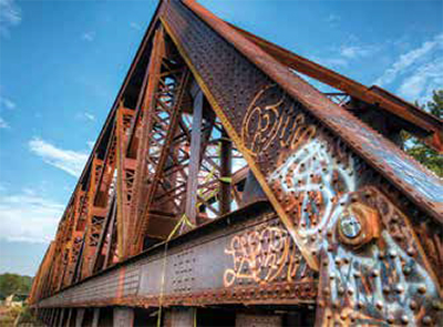 rusty bridge with grafitti