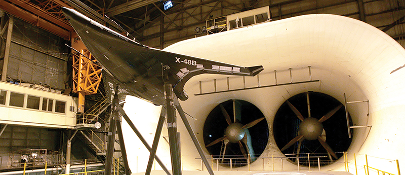A scale model of a Boeing X-48 aircraft in a wind tunnel