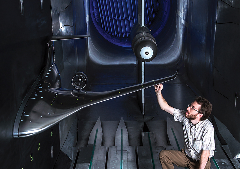 Engineer in the National Transonic Facility wind tunnel with the Hybrid Wing Body airlifter