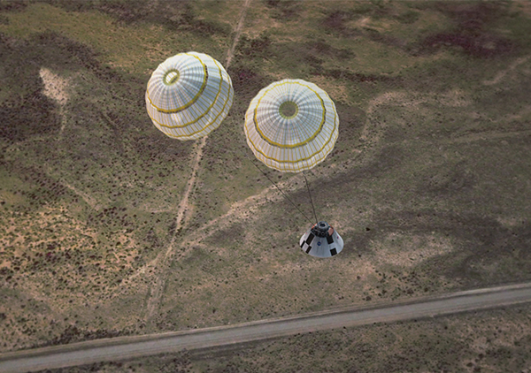 Orion and its parachutes during test flight