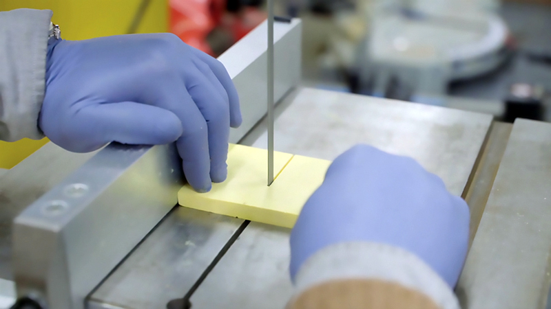 A piece of aerogel being sawed in half