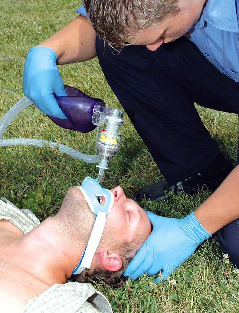 Paramedic using ResQPOD on a patient