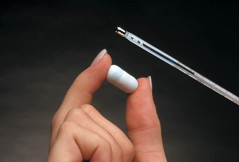The ingestible thermometer pill with a thermometer