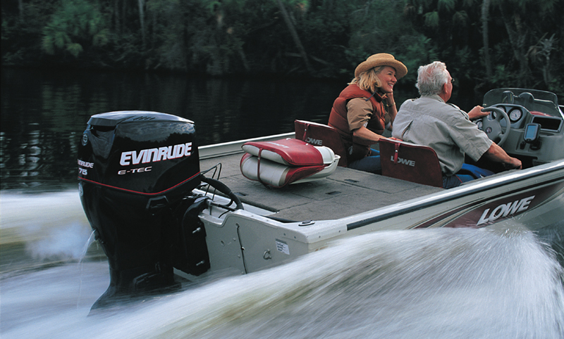 Bombardier Recreation Products Inc.’s Evinrude E-TEC outboard motor on a boat with a couple onboard