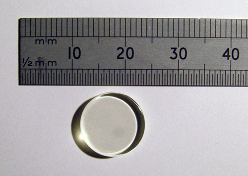 REAl glass disk next to a ruler