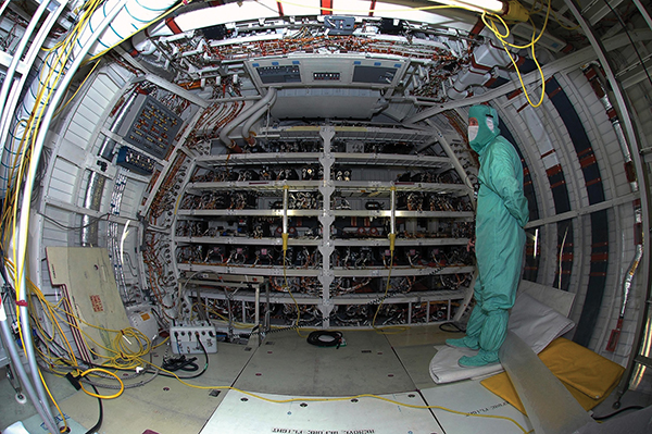 Space shuttle interior with electrical wiring exposed