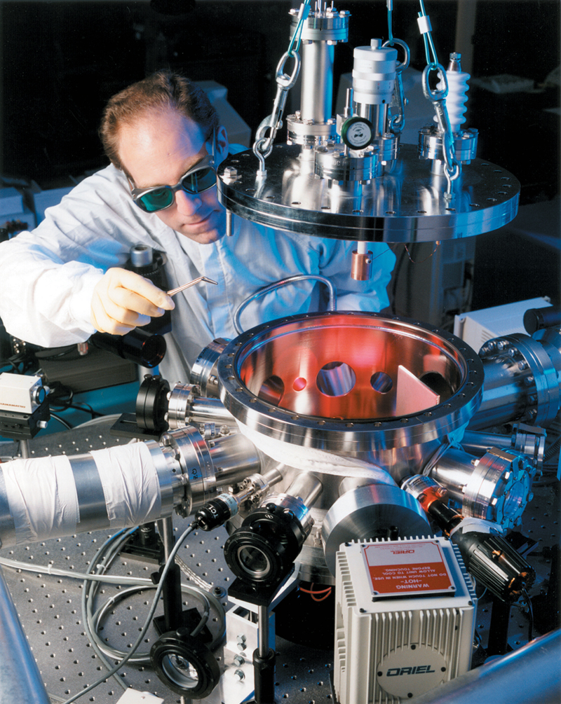 A researcher works with the Electrostatic Levitator