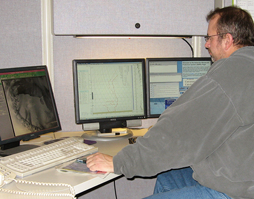 A SeaSpace Corporation employee uses the company's system.