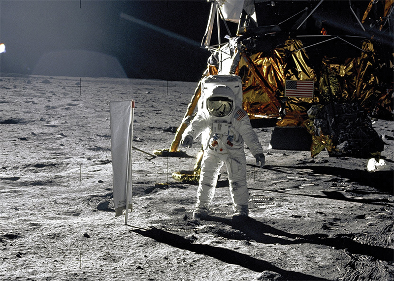 Astronaut and lander on the Moon