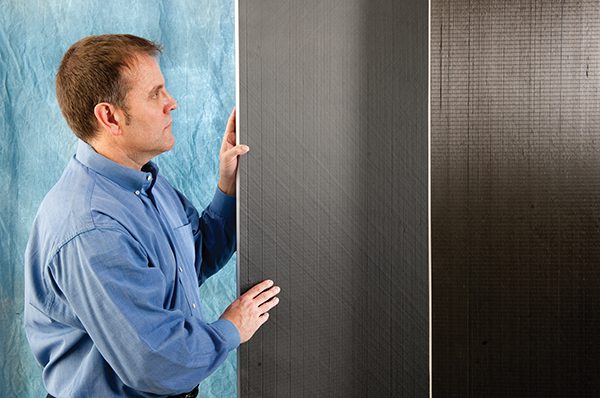 Man with TYCOR panels