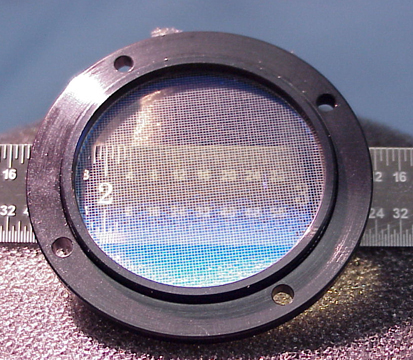 An advanced thin foil filter with a ruler behind it