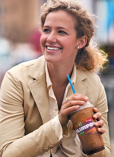 Woman holding a Slurpee