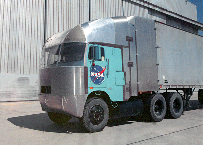 A cab over engine tractor trailer modified to reduce aerodynamic drag
